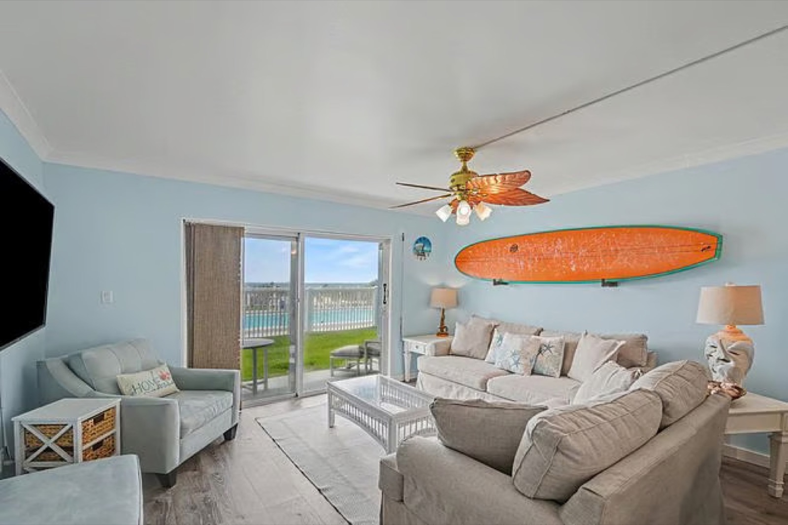 Living room with ocean view through sliding doors